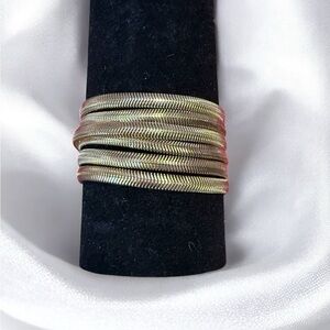 Source‎ Unknown Gold and Silver Bracelet